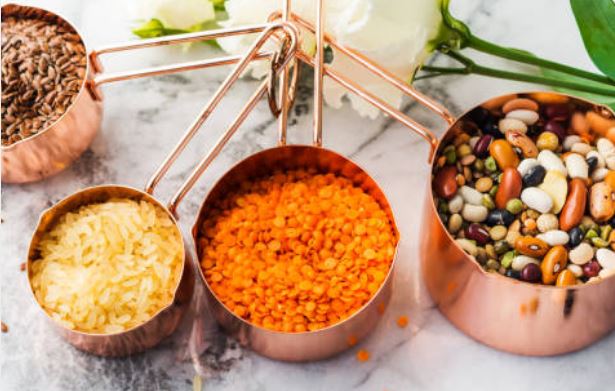 copper measuring cups and spoons