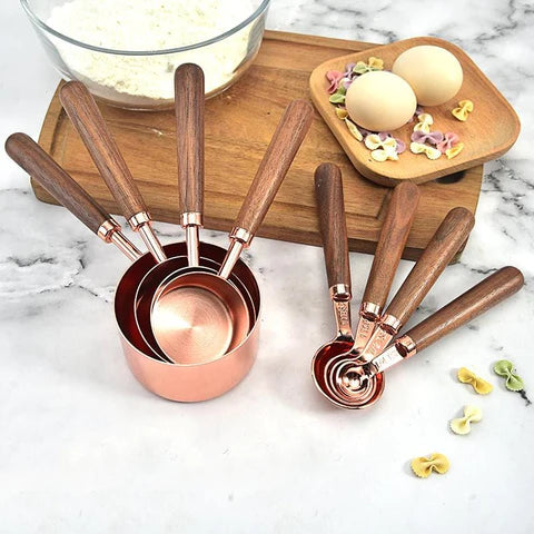 copper measuring cups and spoons