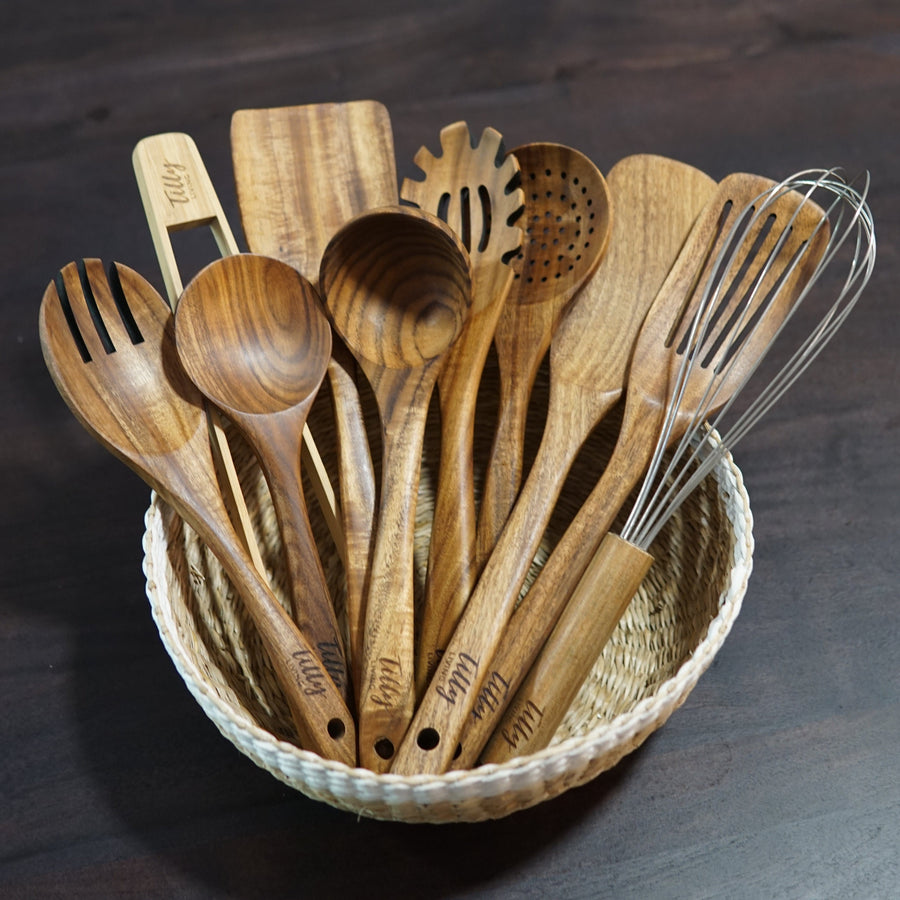 10 piece teak utensil set in a basket
