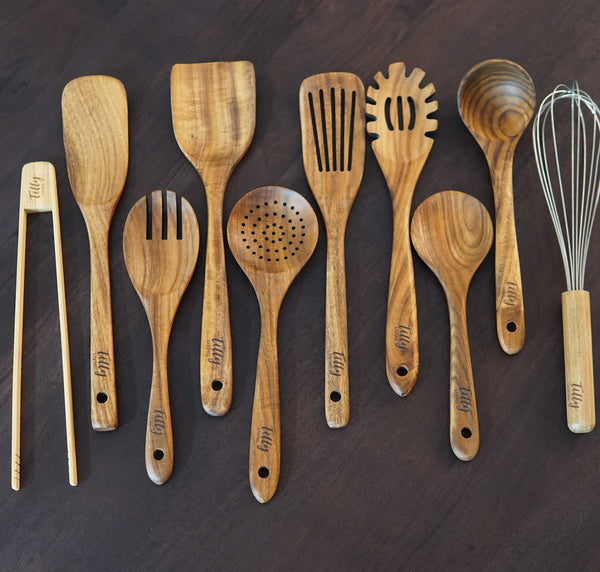 Full 10 piece teak utensil set laid flat