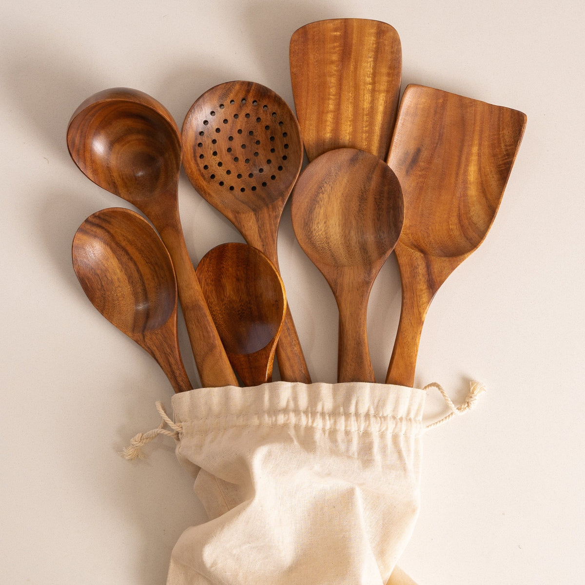 Tilly Living 7 piece teak wooden utensil set in cotton bag